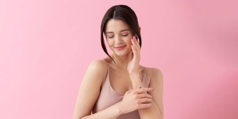 Smiley woman with sensitive skin posing