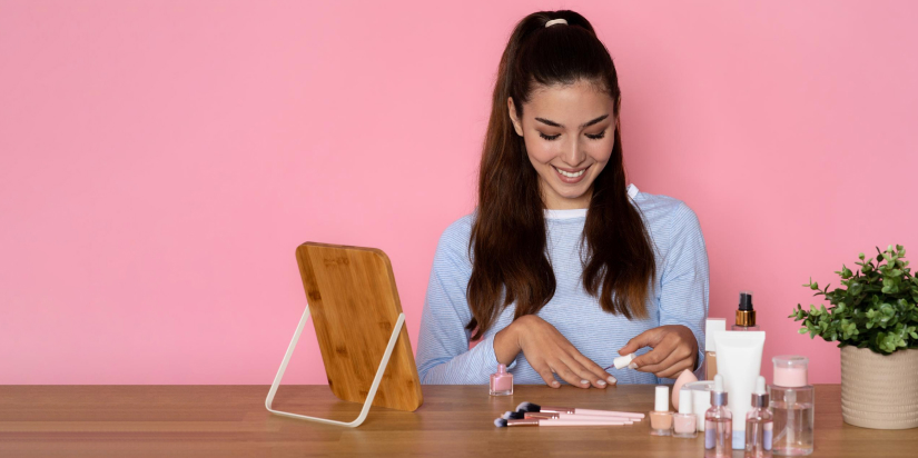 girl painting her nails