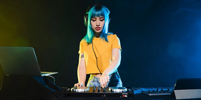 Female DJ performing live